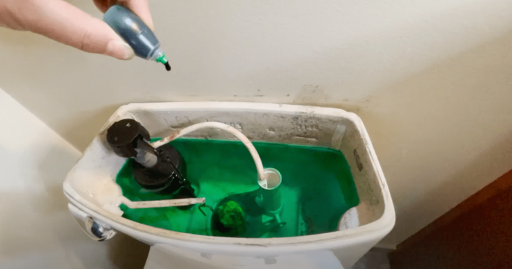Adding food coloring to toilet tank